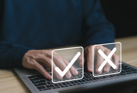 Businessman showing check right and wrong choice The idea is to decide to vote. business options for difficult situations in dilemma. true and false symbols agreeing. Think yes or no decisionsの写真素材