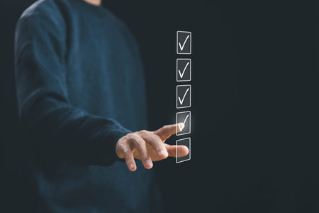 man tick checkmark in the survey item, evaluation tick mark. concept of task audit in a list of documents, option check form online, checklist process order, business verify task detailの写真素材