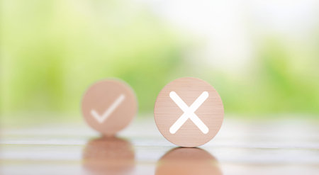 wood block showing check right and wrong. concept decide to choose vote. yes or no decisions, and...