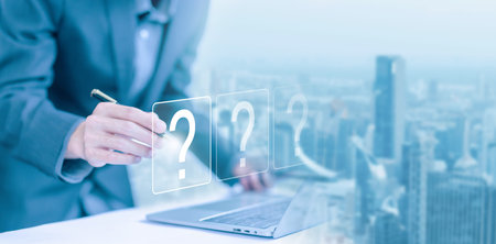 question mark shows on a laptop. concept of ask, answer, Business FAQ, Thinking, and wondering....
