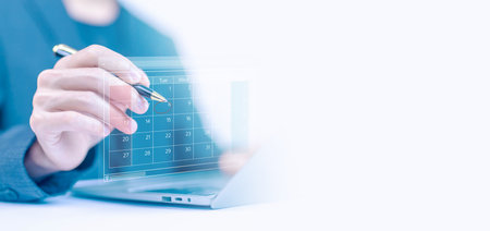 plan schedule calendars online on a laptop, arrange appointment agendas in business and manage planning meetings. timeline design on technology digital conceptの写真素材