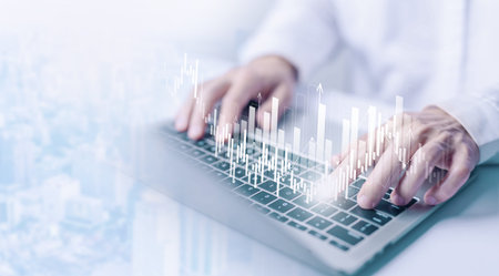 investor analysis of the stock market shows a chart graph. concept of strategy investing in a...
