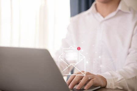newsletter notification and open mail from the laptop. concept of correspondence, and news for...
