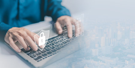 laptop shows the icon lock shield for cybersecurity. concept of secure privacy data, protect cybercrime attacks. security of information servers and network systems. password safe for businessの写真素材