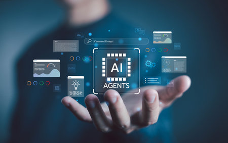 Hand holding AI agents virtual interface with data analytics, automation, and machine learning icons, representing artificial intelligence technology, innovation, digital transformation. AI analysisの写真素材