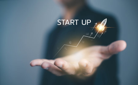 Startup business growth concept with rocket launch, innovation, and success strategy. Perfect for entrepreneurship, new ventures, leadership, and digital transformation projects. start a new businessの写真素材