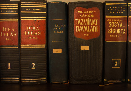 ISTANBUL - TURKEY - JANUARY 5, 2017 - Old hardcover Turkish law books on shelfのeditorial素材