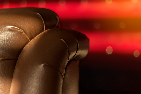 Abstract capture of executive chair on red backgroundの写真素材