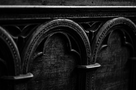 Black and white image of a fragment of an old wooden artwork in church Tuscany Italyの写真素材