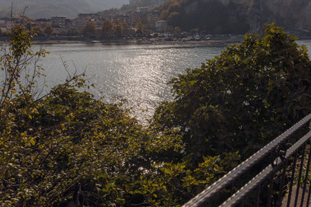 Calm coastal scenes from Amasra, Turkey, featuring clear blue water, rocky cliffs, and a peaceful shoreline under bright daylight.の写真素材