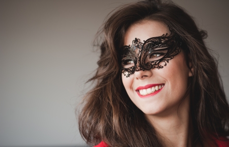 Young girl with mask smilingの写真素材