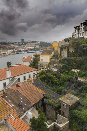 Roofs of old houses next to the river Douro, Porto, Portugalの写真素材