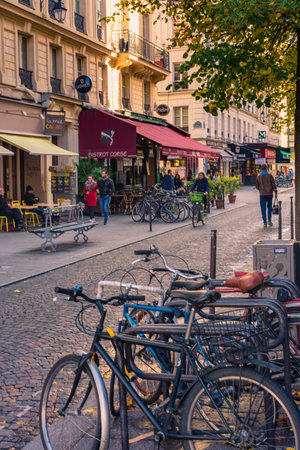 Paris, France - November 7, 2019: Typical image of bicycles and bar terrace on Rambuteau streetのeditorial素材