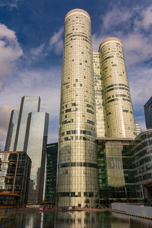 Courbevoie, France - November 9, 2019: La Defense Square. The Total towers, the Coeur Defense Towers and the Fontaine Monumentale (monumental fountain) by Yaacov Agam in 1988のeditorial素材