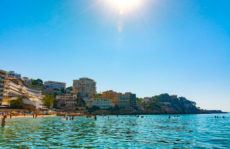 Palma, Mallorca, Spain. July 17, 2022 - Cala Major beach, apartments and hotels buildings. At right side the Marivent Palaceのeditorial素材