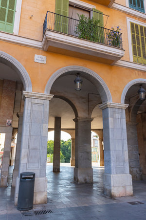 Palma, Mallorca, Balearic Islands, Spain. July 21, 2022 - Arches under the buildings of the Plaza Mayor in Palma, the main square surrounded by arcadesのeditorial素材
