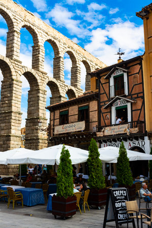 Segovia, Spain. 14, September, 2022 - Well known CÃ¡ndido restaurant, awarded on many occasions, with balconies and terrace in the square, next to the Romanesque aqueduct of Segoviaのeditorial素材