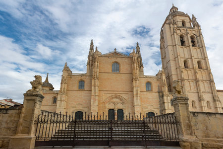 Segovia, Spain. September, 14. 2022 - Cathedral of Our Lady of the Assumption and of San Frutos. Built between the 16th and 18th centuries. UNESCO World Heritage. Main door and belltowerのeditorial素材