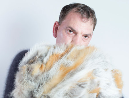 Man and fur coat