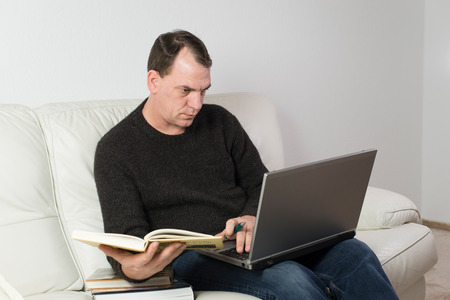 man studying from homeの写真素材