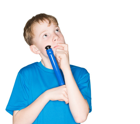 child with a pen in handの写真素材
