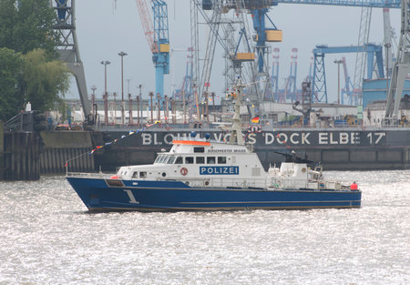 Hamburg Germany May 09 2015: Harbour Birthday in Hamburg with a police boat on the Elbeのeditorial素材