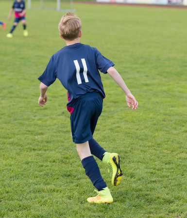 Schleswig Holstein Germany May 17 2015: Children at a football match on May 17th 2015のeditorial素材