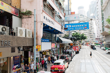 Hong Kong downtown in the rainy season with smog cloudのeditorial素材