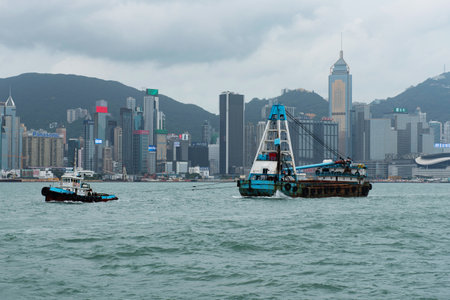 Hong Kong skyline in the rainy season with smog cloudのeditorial素材