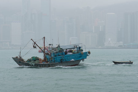 Hong Kong building is being rebuilt with smog cloudのeditorial素材