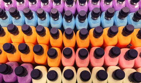 Wash chemical detergent in bright colors for clothesの写真素材