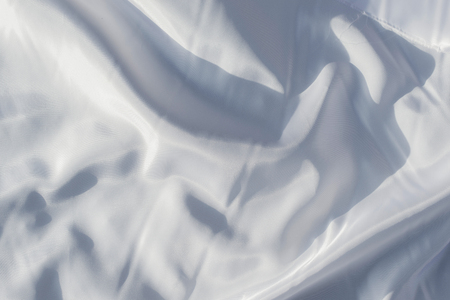 white flag as a texture photographedの写真素材