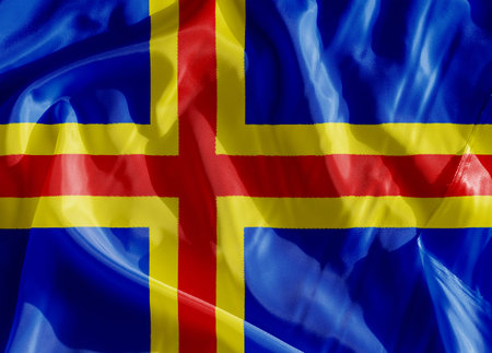 Aland Flag on a cloth in close-upの写真素材