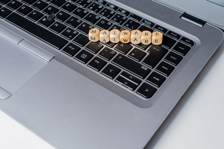 Malware word on notebook keyboardの写真素材