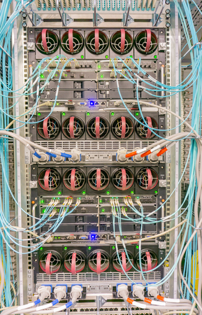 Network switch connections for network cable RJ45 and cable fiber optic cableの写真素材