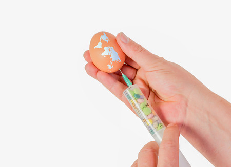 Dioxin scandal poisoned eggs with disposable syringeの写真素材