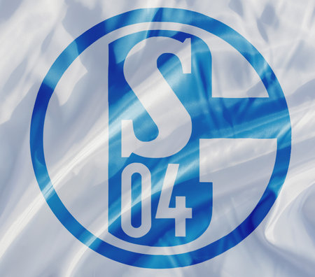 Close-up of waving flag with Schalke 04 football club logo from Germany, german text for Schalke 04のeditorial素材