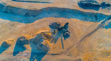 Gravel quarrying in a gravel pit during a drone flight