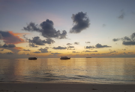 Sunset on the beach of the Maldives