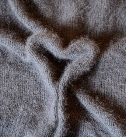 Angora sweater as a heart shape for a background and composing