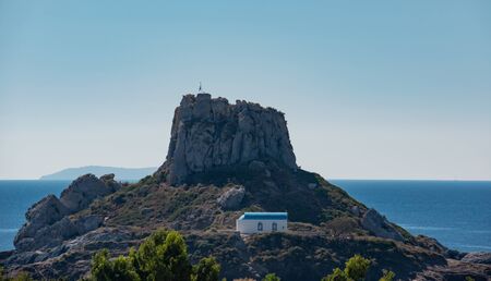 Blue white church on the small island of Aghios Stefanos Kefalos Kos Greeceの写真素材