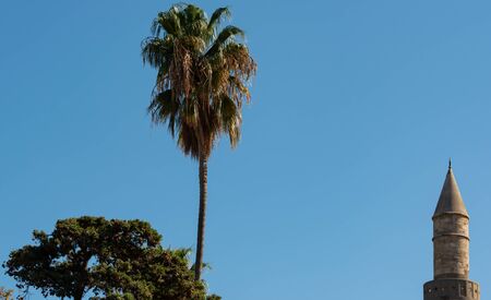 Spire of the Defterdar Mosque on the main square of Kos town on the island of Kos Greeceの写真素材