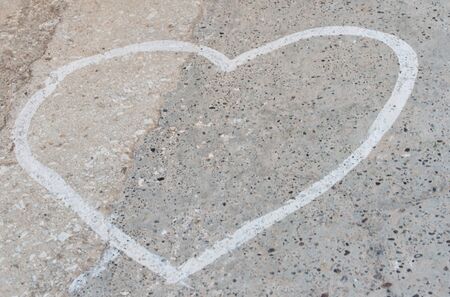 Stone wall with heart texture as a background for composingの写真素材