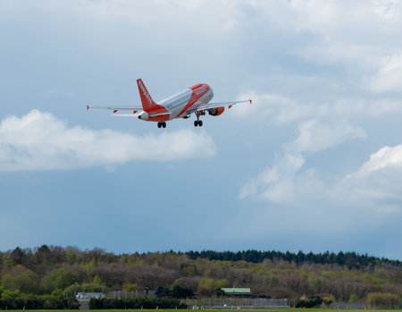 aircraft taking off on a runway at Hamburg Airportのeditorial素材