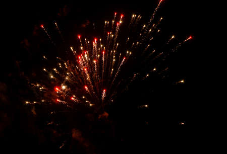 abstract sparks from a New Year's fireworks for backgroundsの写真素材