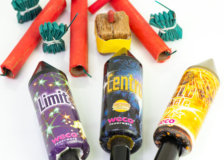 Decorated firecrackers and New Years rockets of the company Weco on white backgroundのeditorial素材