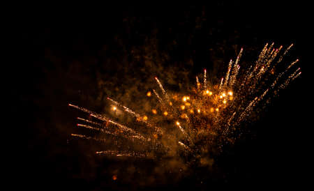 abstract sparks from a New Year's fireworks for backgroundsの写真素材