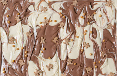 White and brown chocolate prepared for a broken chocolateの写真素材