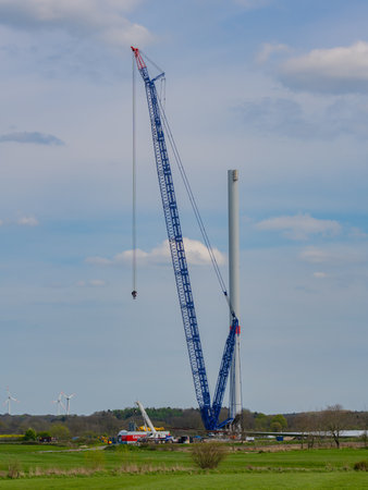 Hamburg, Germany - May 01, 2023: Erection of a wind turbine of the company Vestas with a blue Liebherr LR 1700-1.0 crawler crane of the company Liebherrのeditorial素材