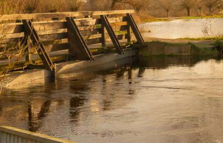 Sunset, fields and meadows flooded after a stormの写真素材